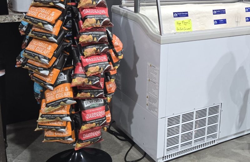 Rack of Walnut Creek chips next to the ice cream case